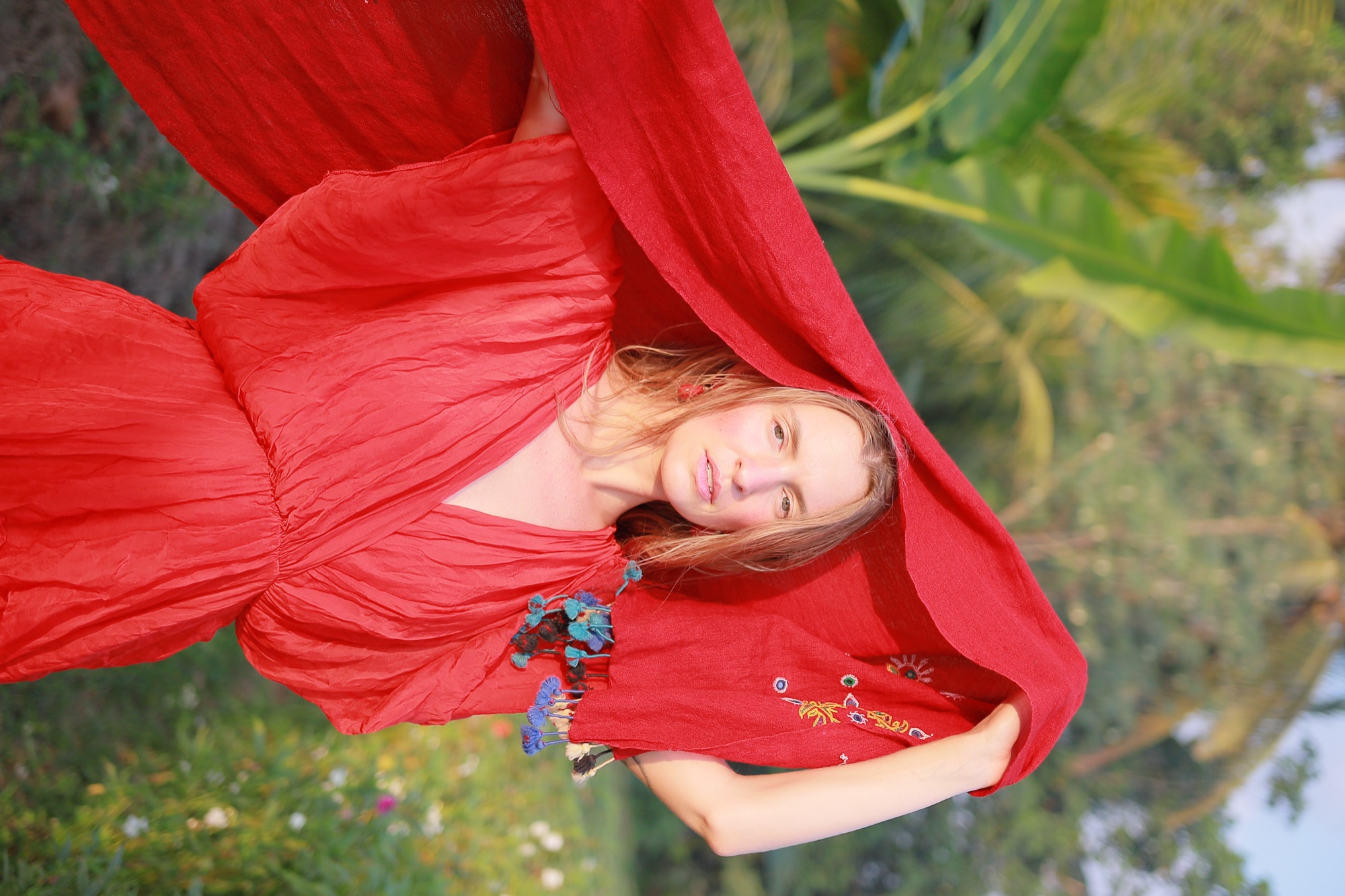 Bliss in a red cape in the jungle