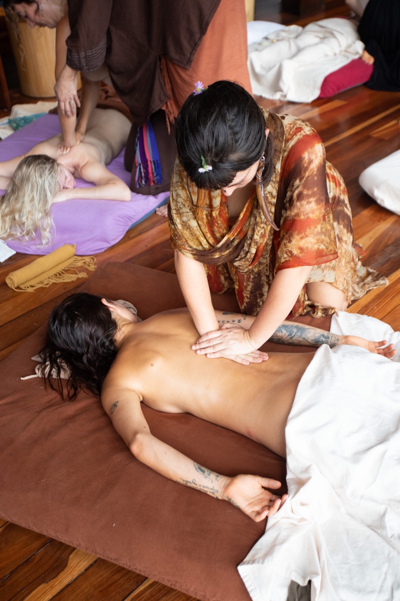 Hands giving a back massage